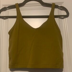 Lululemon Green Align Tank, Sz 4, no pads
FLAW in the front small hole pictured